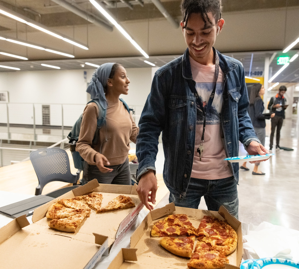 Students with pizza