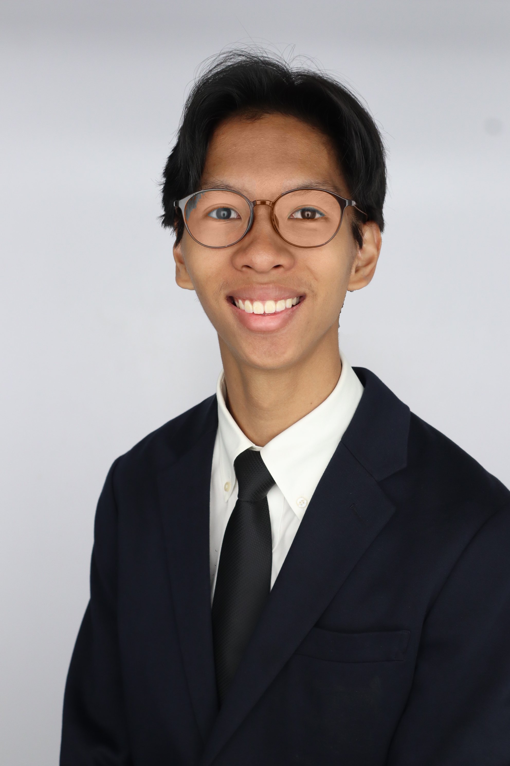 Divo smiles at the camera.