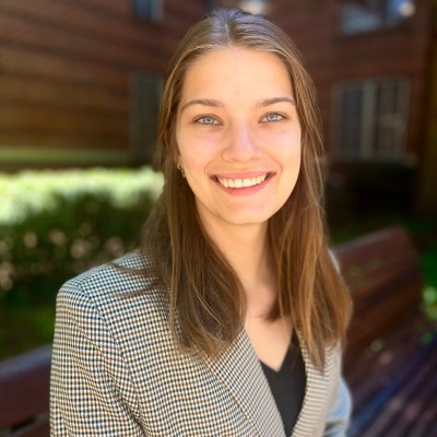 Elizabeth smiles at the camera.